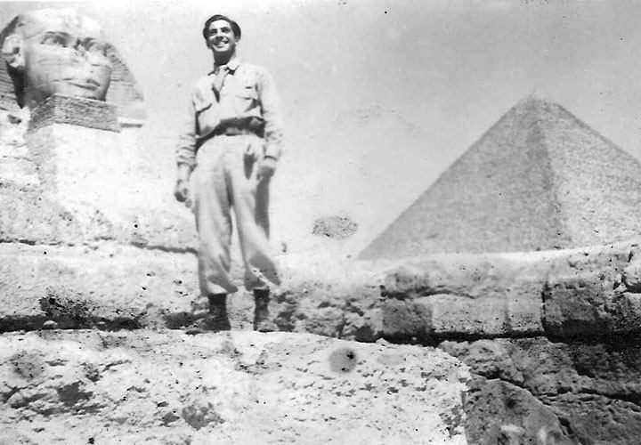 Stained old photo of American GI in front of the Sphinx in Egypt.