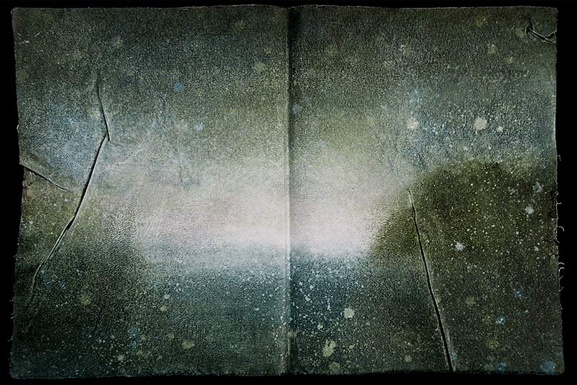 Painting of a a glowing dawn seen through forested bluffs, in the form of an ancient book.