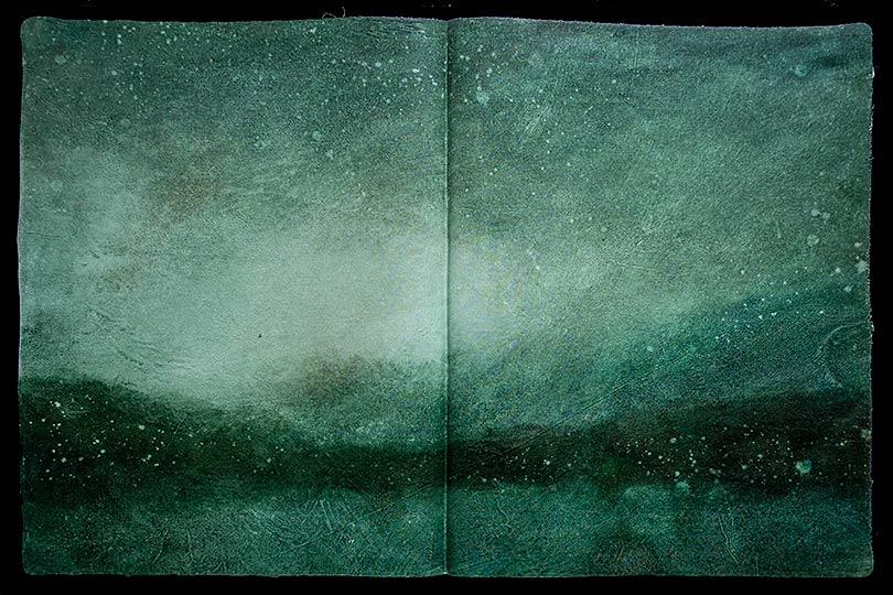 Painting of mountain rain storm, in the form of an ancient book.