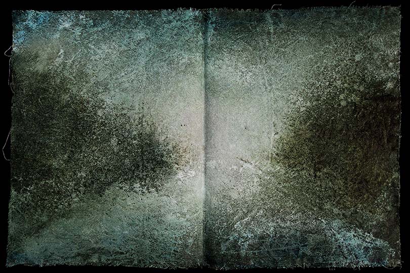 Painting of a sunlit road in the form of an ancient book.