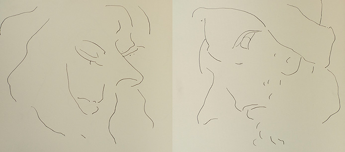 Ink line drawings of faces in motion.